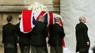 Pallbearers carry the coffin of former British prime minister Margaret Thatcher into the Palace of Westminster