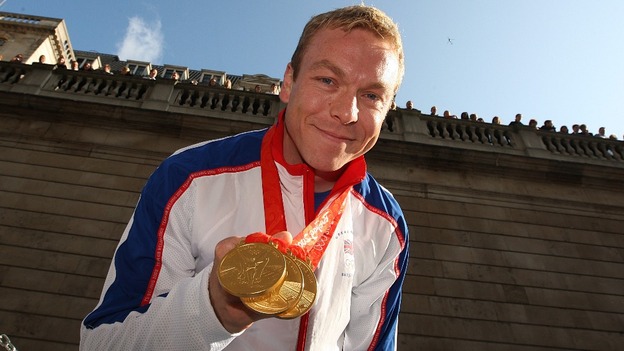 Sir Chris Hoy chows off his hat-trick of Gold from the 2008 Beijing Olympics.