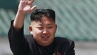 North Korea leader Kim Jong-un waves to the crowd