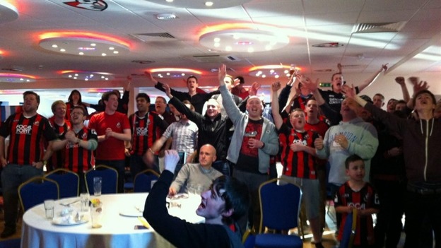 Fans raise a glass