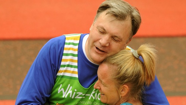 An exhausted looking Ed Balls MP at the finish line of the London Marathon.
