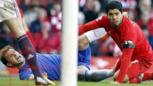 Liverpool's Luis Suarez (right) and Chelsea's Branislav Ivanovic