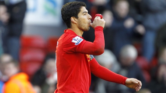 Liverpool's Luis Suarez celebrates scoring his team's second goal of the game