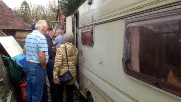 Residents prepare to leave their protest site