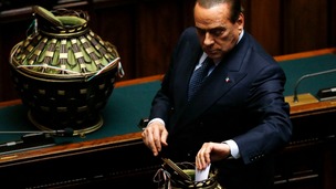 Italy's former Prime Minister Silvio Berlusconi casts his ballot during the third day of the presidential election in the lower house.