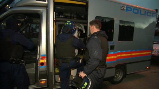 Metropolitan Police arrest a suspect after violence at the FA Cup match between Millwall and Wigan.