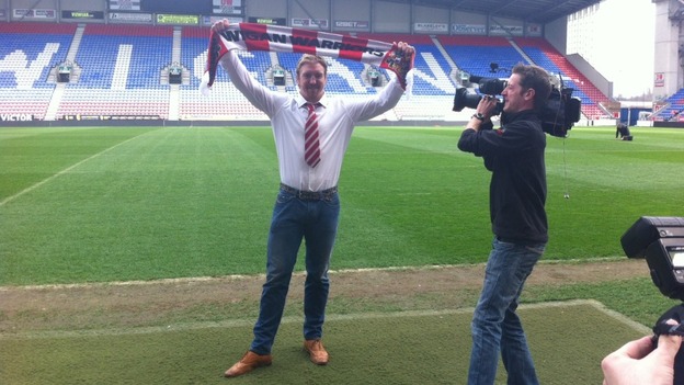 Powell with Wigan scarf