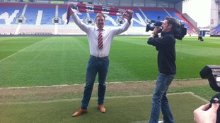 Powell with Wigan scarf