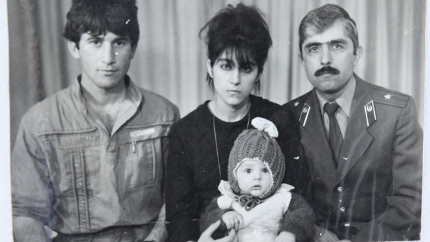 A photo, showing Tamerlan (C, bottom) Tsarnaev, accompanied by his father Anzor (L), mother Zubeidat and uncle Muhamad Suleimanov (R)