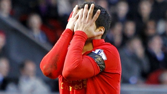 Luis Suarez reacts after a missed chance on goal at the weekend