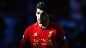 Luis Suarez pictured after he bit Chelsea's Branislav Ivanovic  