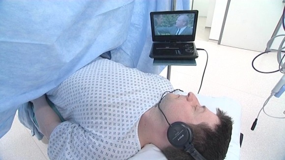 Hospital patients watch films during surgery