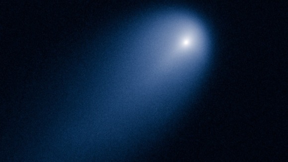 This image was taken in visible light. The blue false color was added to bring out details in the comet structure.
