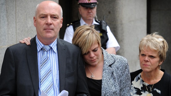 Bob and Sally Dowler, parents of murdered school girl Milly Dowler and her sister Gemma (centre