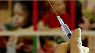 A nurse handles a syringe at a medical centre in Ashford, Kent