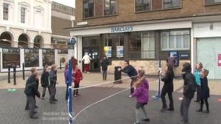 children playing volleyball