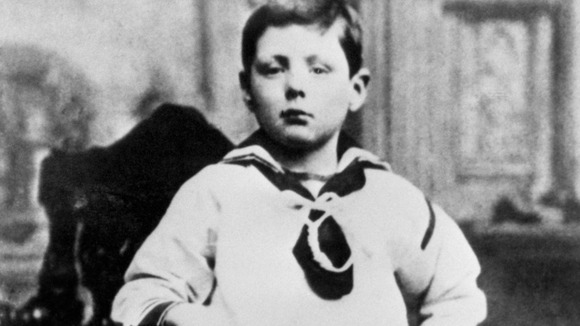 Winston Churchill as a seven year old in a seaman's suit.