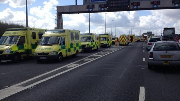 Emergency services at M62 minibus crash