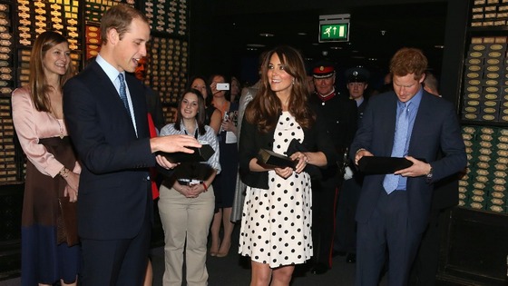 The Duke and Duchess of Cambridge and Prince Harry are presented with wands at the end of the Harry Potter Tour.
