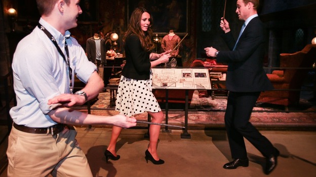 The Duke and Duchess of Cambridge get some tips on duelling with their wands.