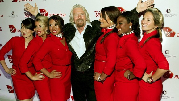 Sir Richard Branson with Virgin Atlantic air stewardesses
