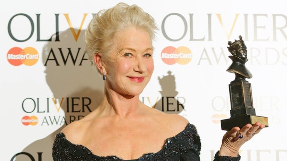 Dame Helen Mirren shows off her Olivier Award for Best Actress.