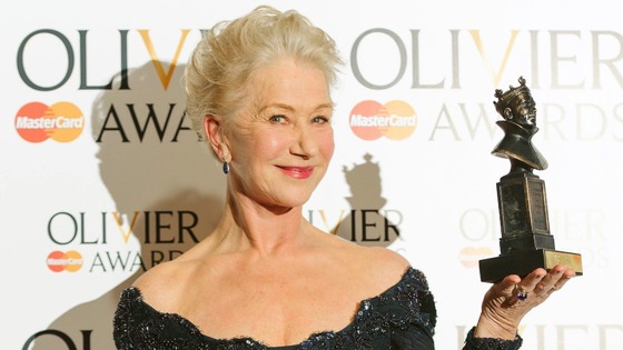 Dame Helen Mirren shows off her Olivier Award for Best Actress.