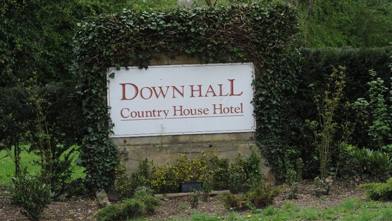 The entry sign to the hotel