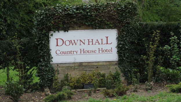 The entry sign to the hotel