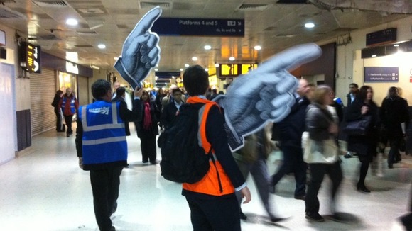 The 'giant hands' of New Street's 60 volunteers directs passengers