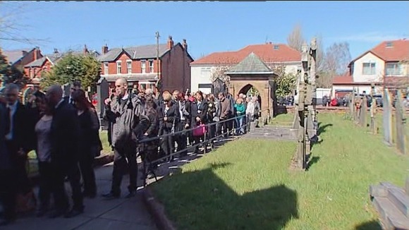 Hundreds of mourners attended the service in Formby, Merseyside.