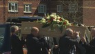 Anne William's coffin is carried into the church