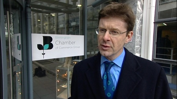Photo of Cities Minister Greg Clarke standing outside Chamber of Commerce