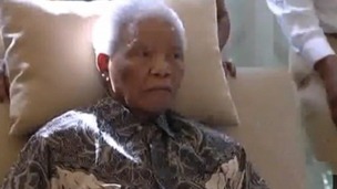 Nelson Mandela pictured for the first time since he was discharged from hospital.