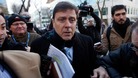 Spanish doctor Eufemiano Fuentes is surrounded by media as he enters a courthouse in Madrid