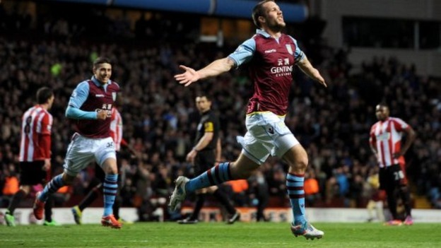 Aston Villa's Ron Vlaar celebrates scoring his side's first goal of the game