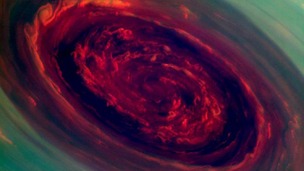 Saturn's north polar storm spinning vortex resembles a giant ros