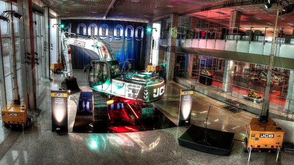 Behind the glass in the reception is the millionth machine.