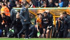 Wolves manager Dean Saunders is dejected at the final whistle after losing to Burnley