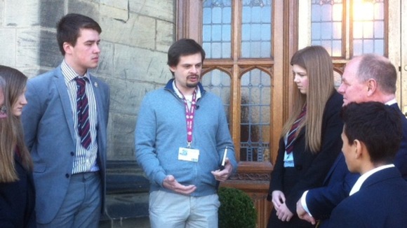 Dylan Wilks chats to students and staff at his old school, Bradford Grammar.
