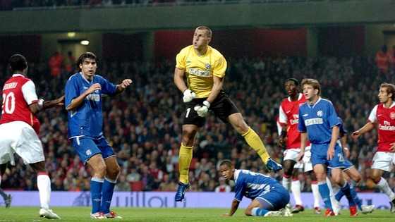 Ivan Turina, playing for Dinamo Zagreb, clears the ball against Arsenal in a UEFA Champions League third round qualifying match in 2006.