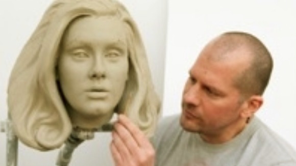 Sculptor Louis Wiltshire works on Adele's clay head
