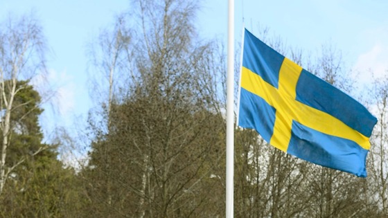 A Swedish flag at half-mast outside the training ground of Turina's club, AIK Solna in Stockholm.