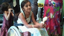 Thusha Kamaleswaran, now six, was left paralysed after being shot last year 