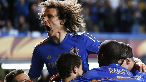 Chelsea's David Luiz celebrates with team-mates after the goal by Victor Moses