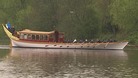 The royal row barge takes to the Thames.