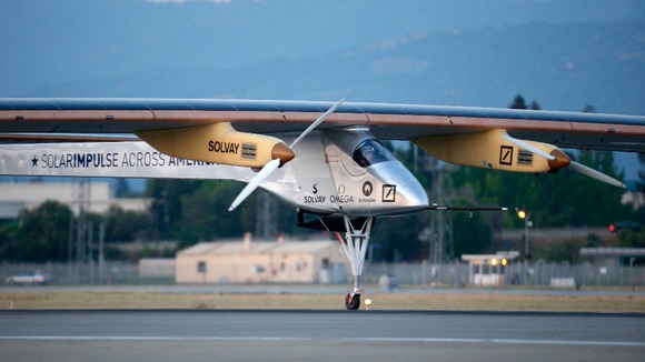 The Solar Impulse aircraft takes off as it attempts to fly across the US with no fuel, instead using just the sun's energy