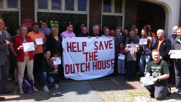Campaigners outside the pub