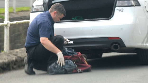 Police looking in boot