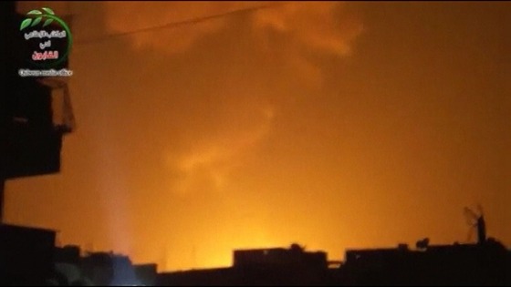 Explosion at what is said to be a weapons cache belonging to the Syrian airforce.